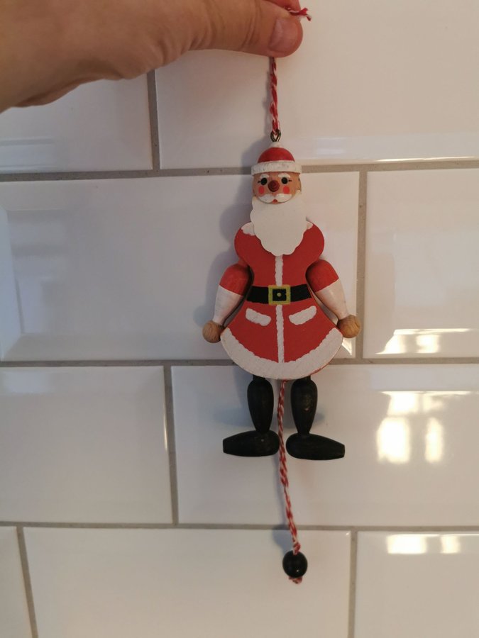 Jultomte i trä från M Gschnitzer