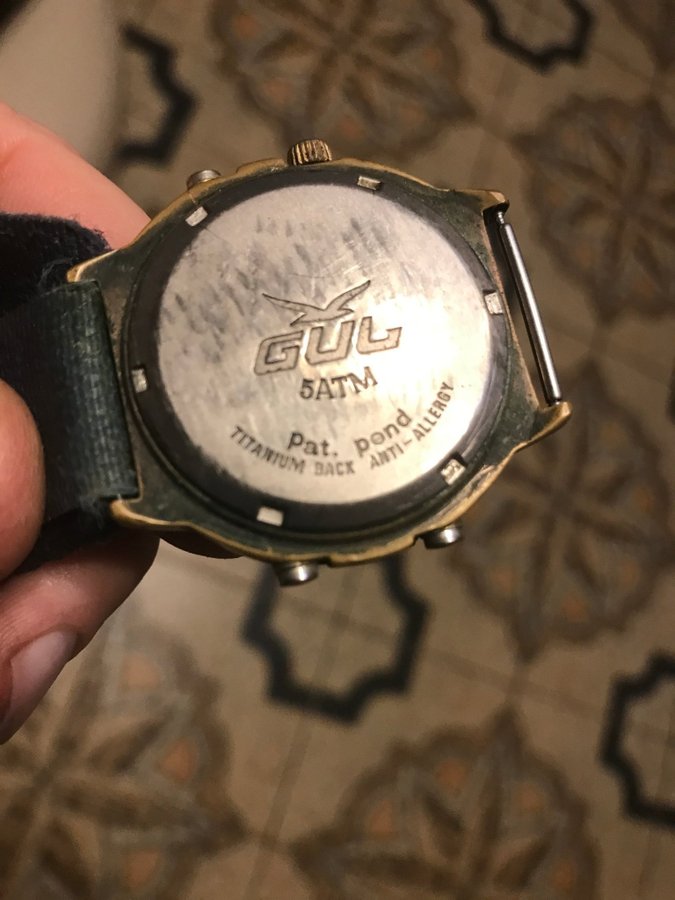 rare GUL watch with brass case and titanium caseback