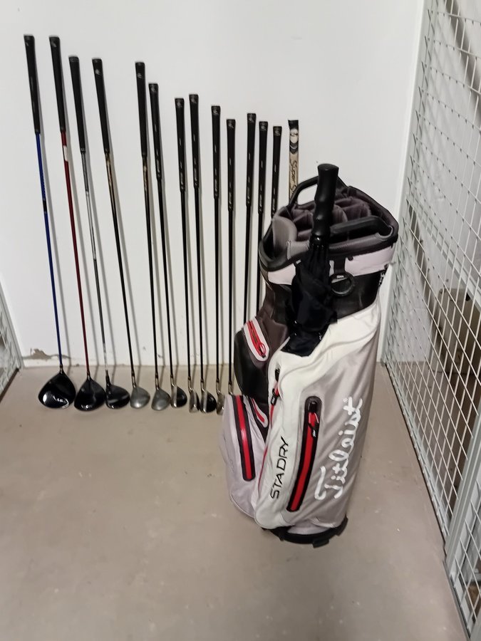 Golfset med eldriven vagn