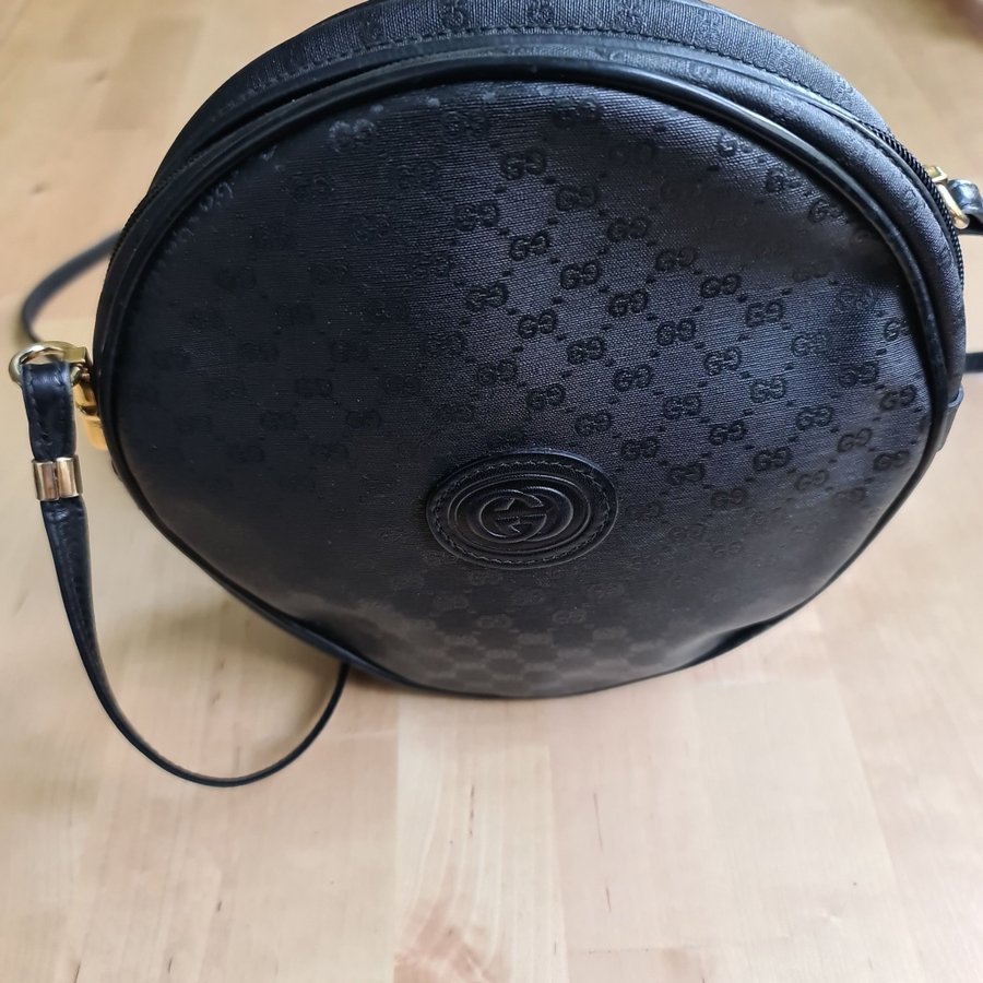 Gucci GG vintage canteen rund axelremsväska