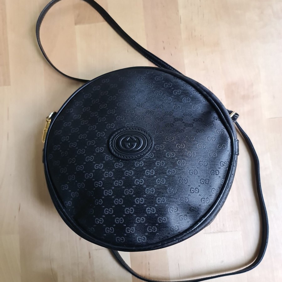 Gucci GG vintage canteen rund axelremsväska