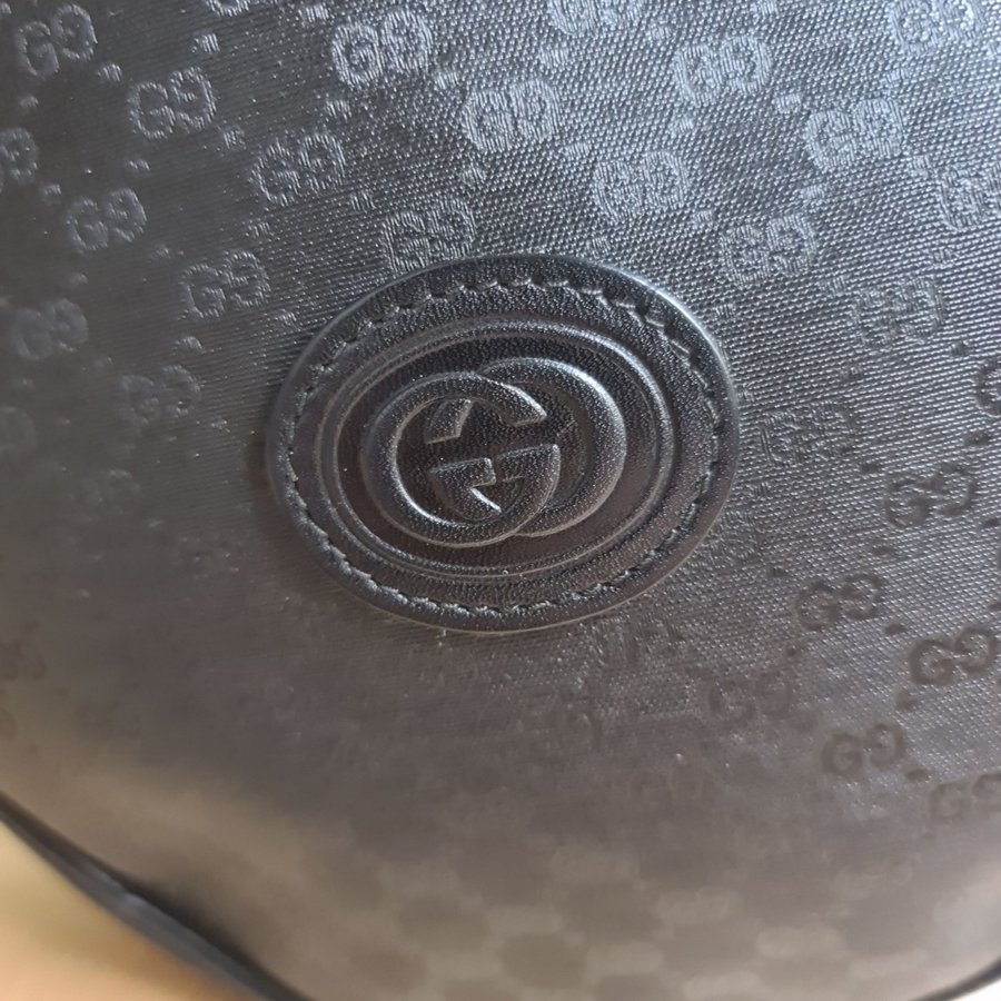 Gucci GG vintage canteen rund axelremsväska