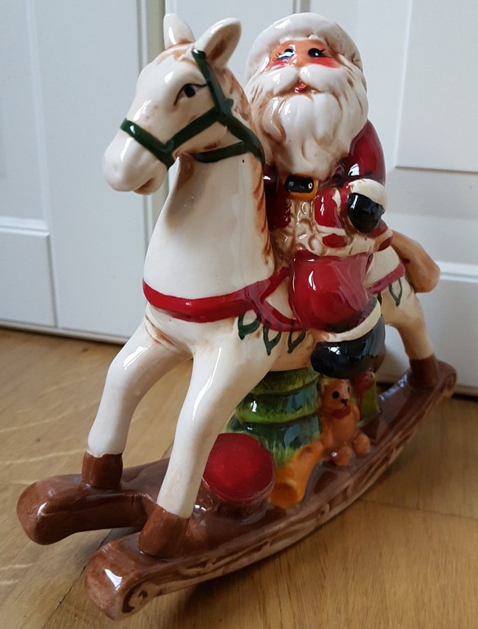 Jultomte på gunghäst