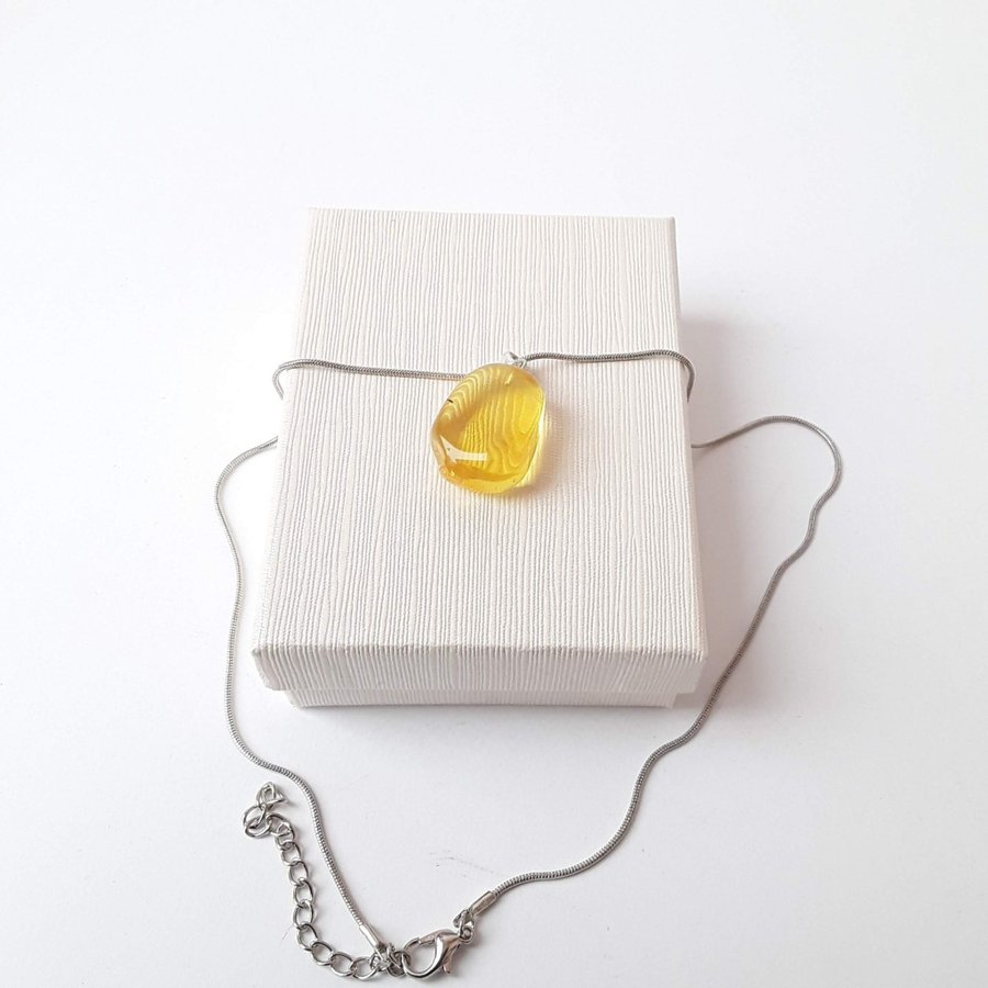 Clear Baltic amber oval pendant Yellow gemstone pendant on silver color chain