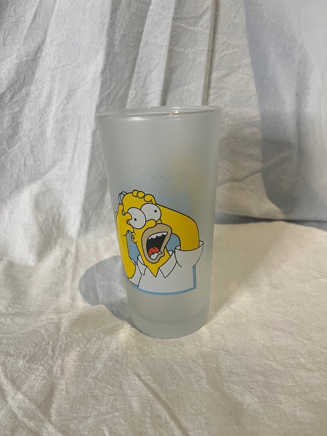 SIMPSONS GLAS MED TVÅ MOTIV