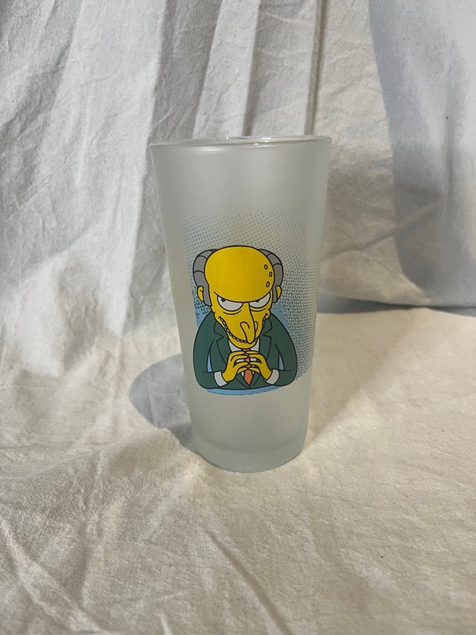 SIMPSONS GLAS MED TVÅ MOTIV