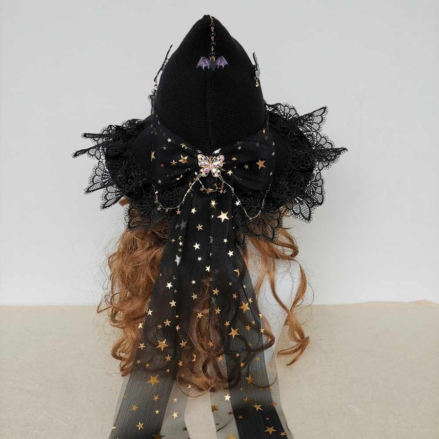 Handmade black wool blend witch hat with bow. Crochet Halloween wizard hat