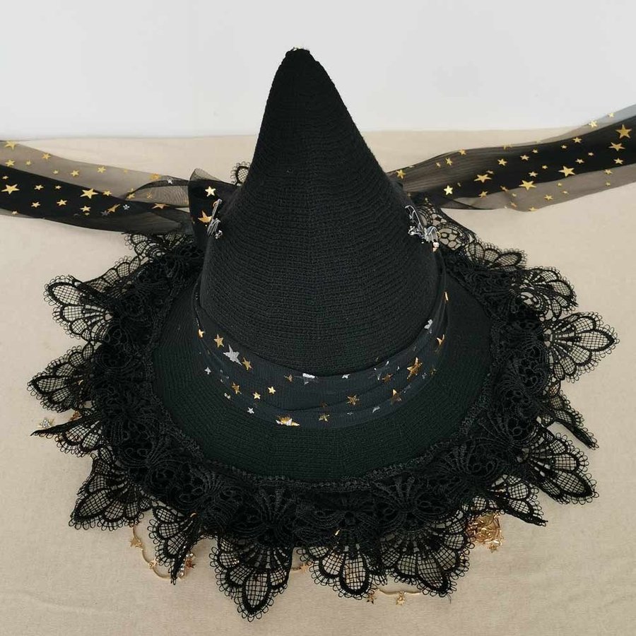 Handmade black wool blend witch hat with bow. Crochet Halloween wizard hat