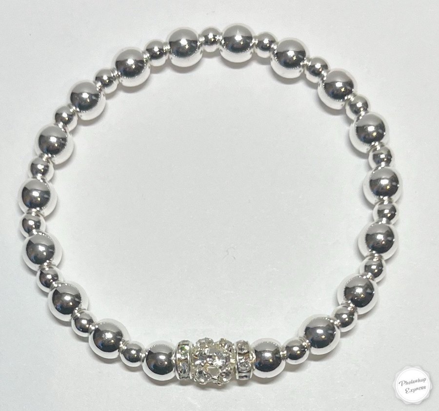 Ett armband stretch med hematit/strass