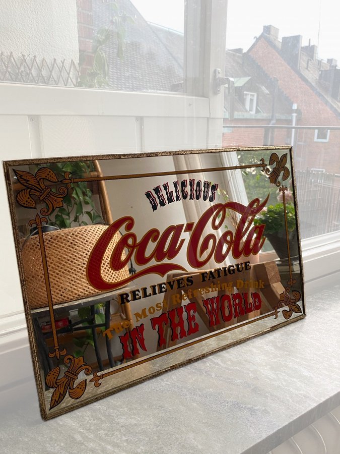 Retro vintage spegel med coca cola motiv