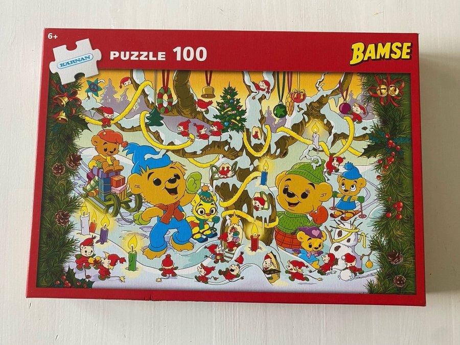 Pussel med Bamse. Julmotiv. 100-bitar.