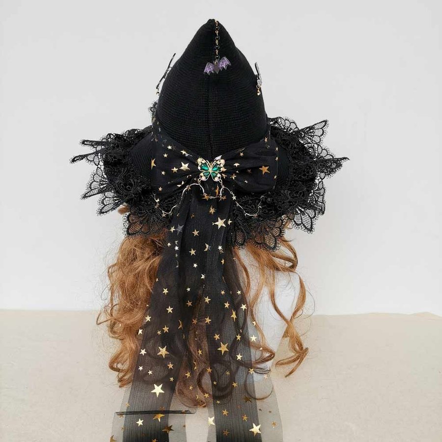 Handmade black wool blend witch hat with bow. Crochet Halloween wizard hat