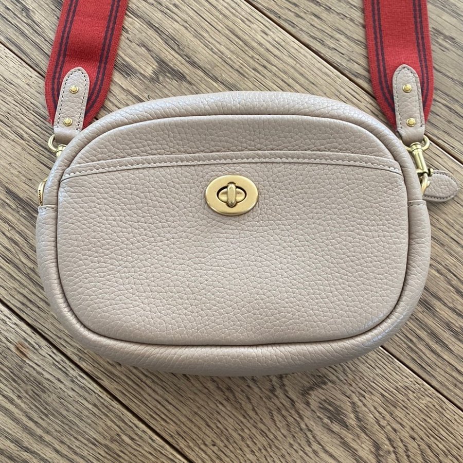 Beige COACH camera bag