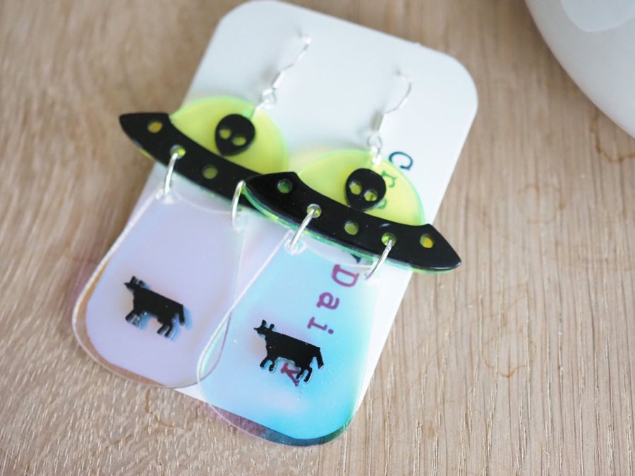 UFO kidnapping cow earrings