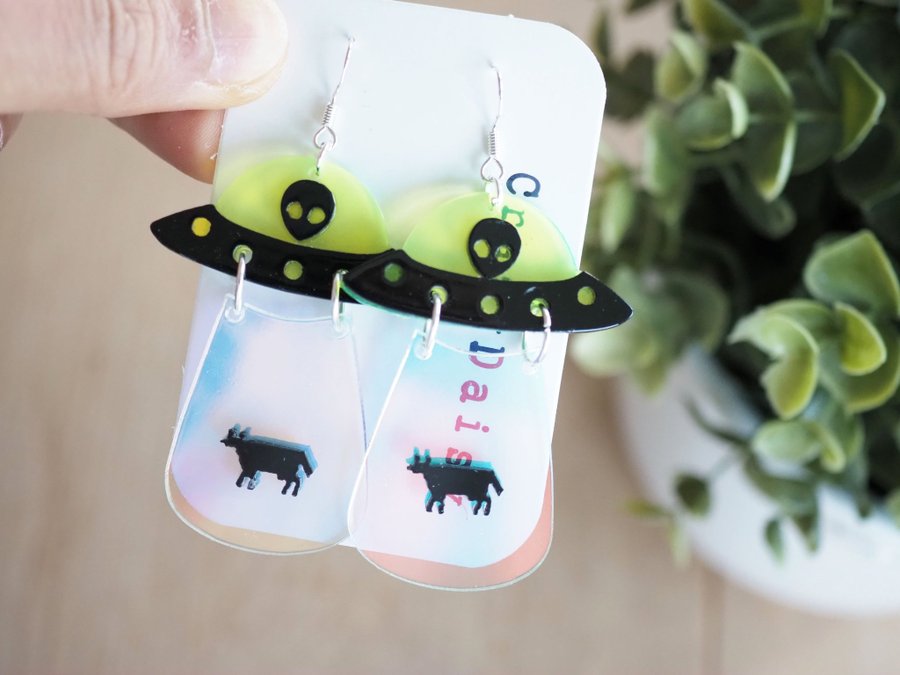 UFO kidnapping cow earrings