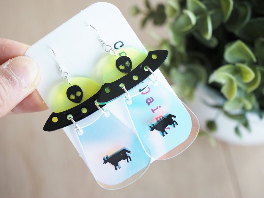 UFO kidnapping cow earrings