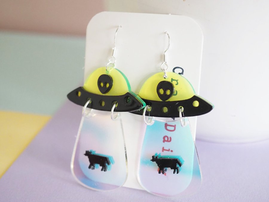 UFO kidnapping cow earrings