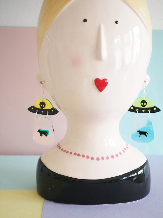 UFO kidnapping cow earrings