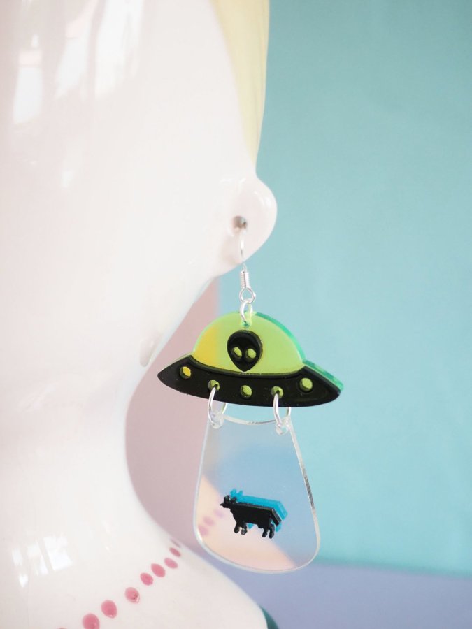 UFO kidnapping cow earrings