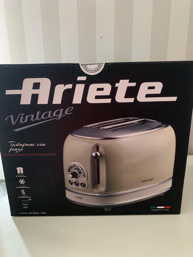 Oöppnad Ariete vintage brödrost beige