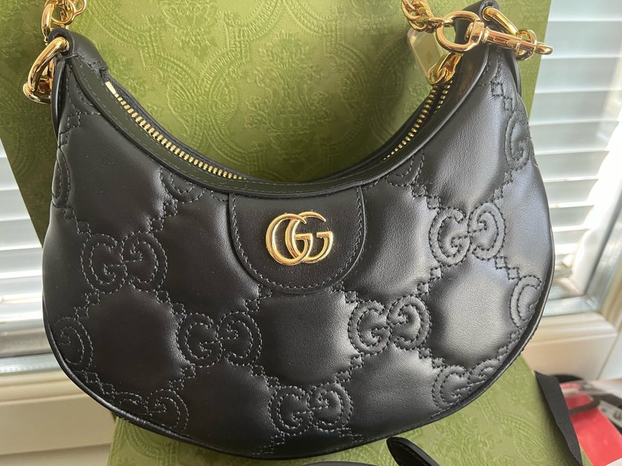 Gucci matelasse moon mini bag