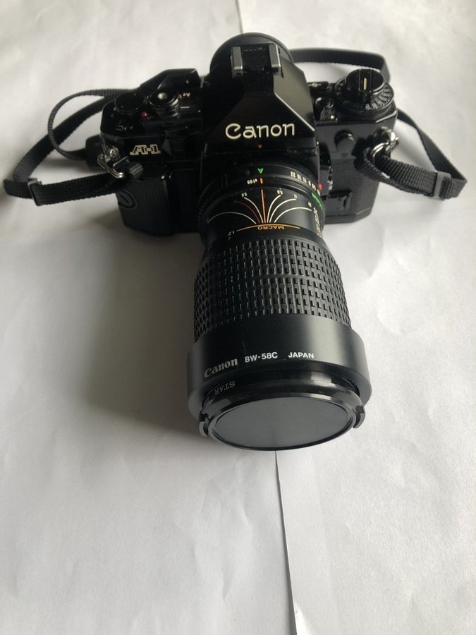 CANON A1 FD35-105/F3,5-4,5,STANDARD OBJEKTIV,BLIXT 299T, VÄSKA ALLT I NYSKICK