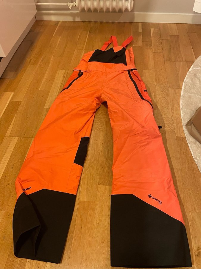 Peak Performance orange skidbyxor, storlek XS