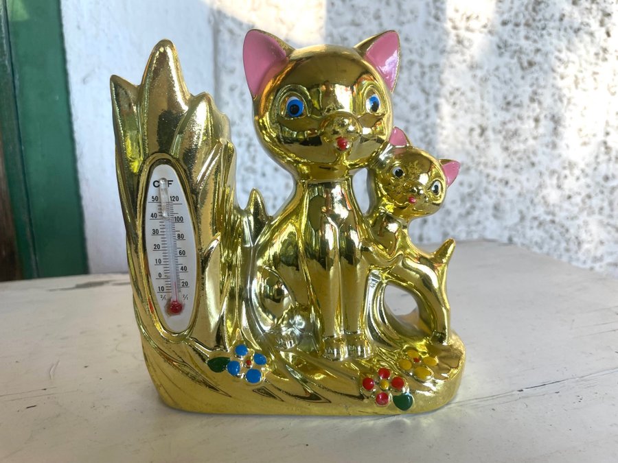 Vintage katt med termometer retro