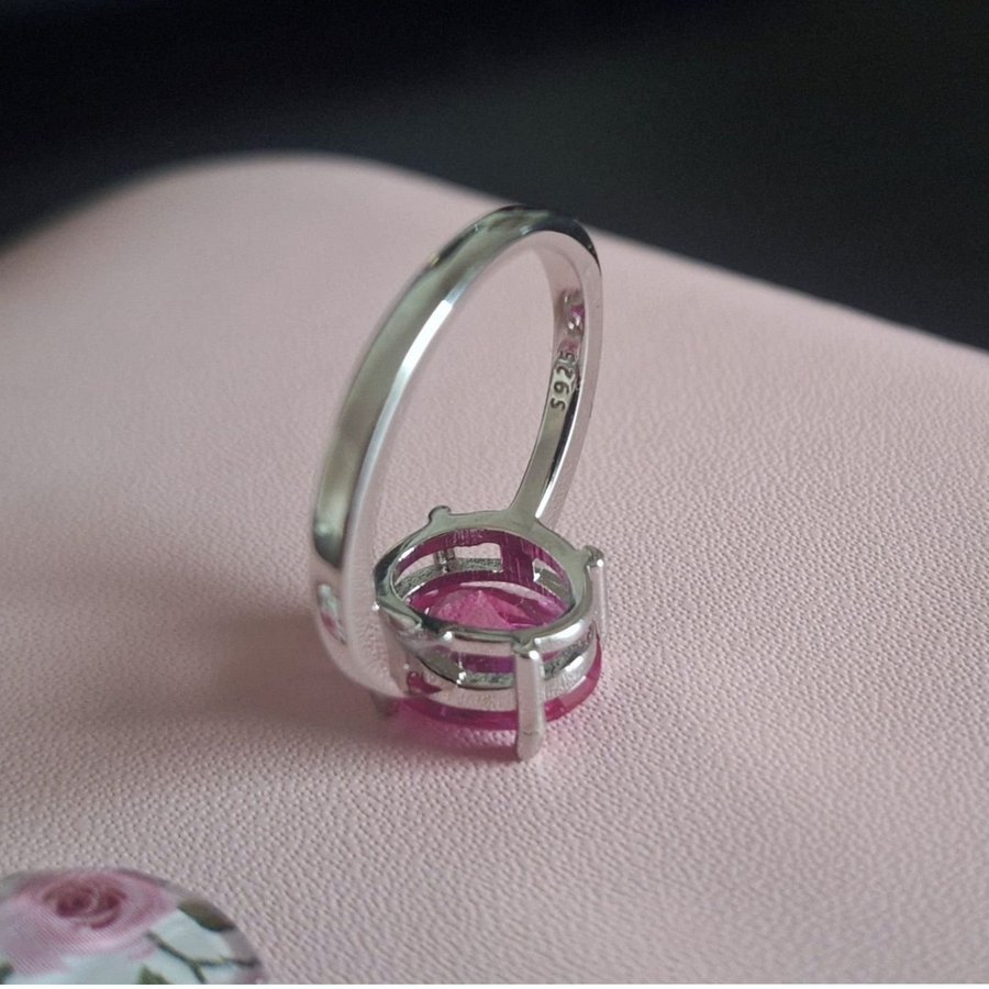 Silver ring with a synthetic gemstone