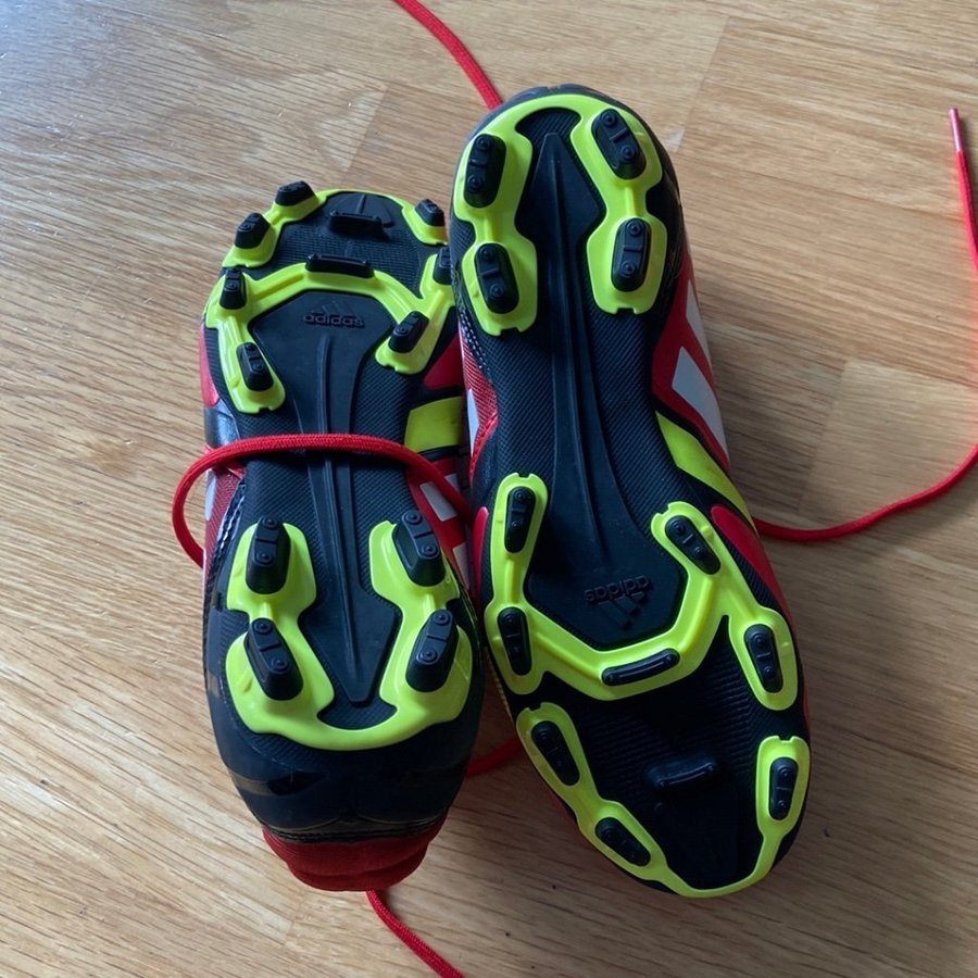 Nya fotbollsskor stl 38 2/3 Adidas male kille röd/gula nitrocharge 2.0