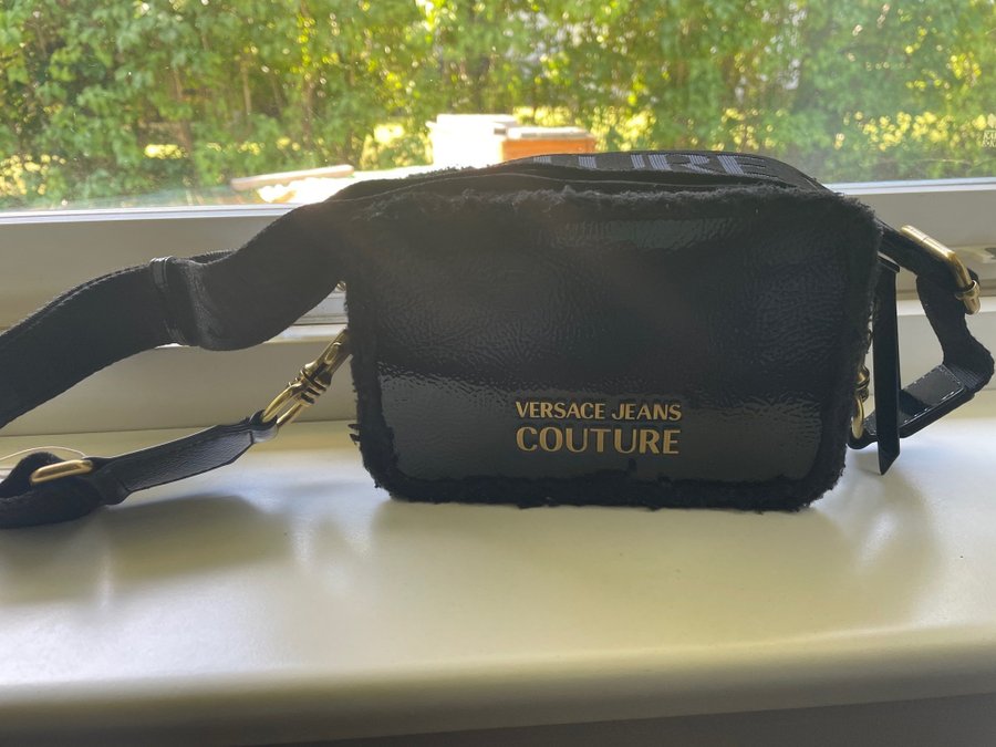 Versace shoulder bag modern and trendy