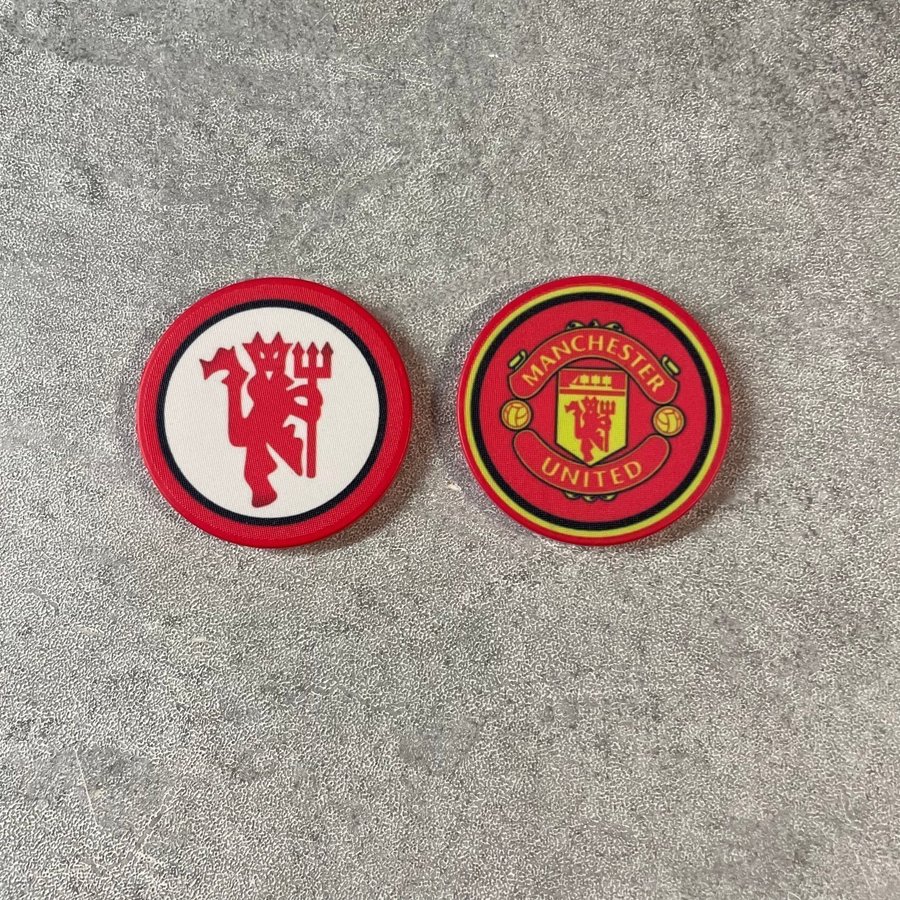 2-pack Manchester United golfbollsmarkörer