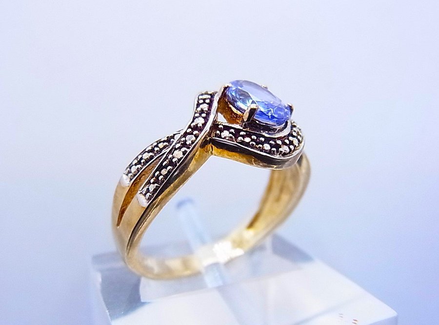 DESIGNER TANZANITE RING HARRY IVENS.