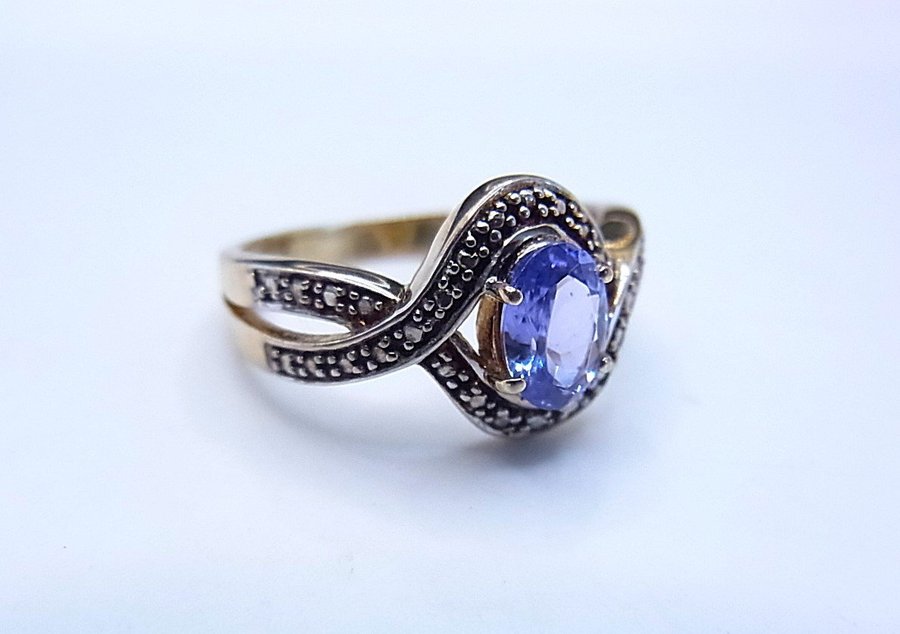 DESIGNER TANZANITE RING HARRY IVENS.