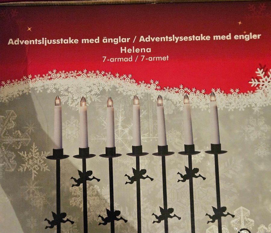 Adventsljusstake i smide med änglar och manschetter. I originalförpackn. Advent