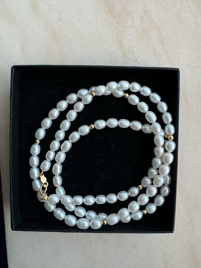 18 k gold necklace and bracelet with real pearls