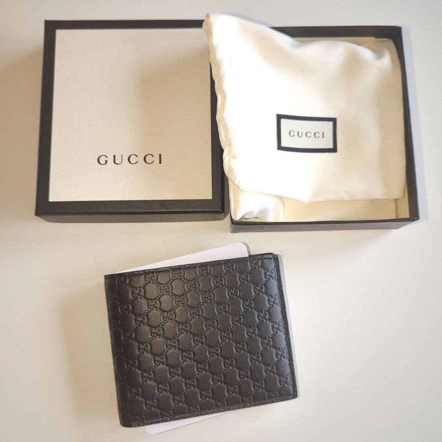 New and unused. Micro guccissima wallet. Men's. Black.