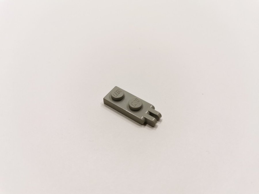 Lego - hinge - solid stud - 2 fingers - 1x2 - 4276a - ljusgrå (old light gray)