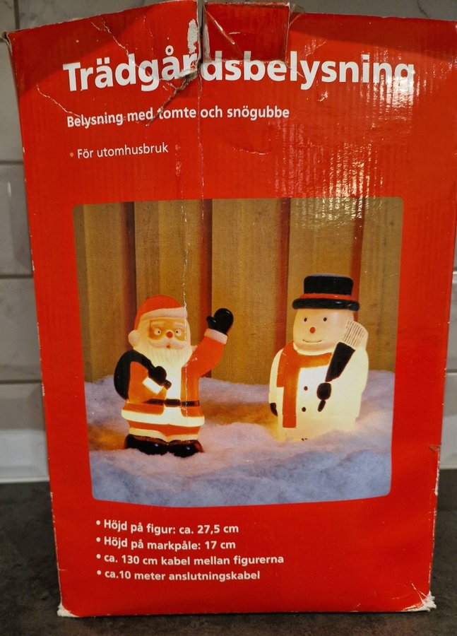 Trädgårdsbelysning med tomte och snögubbe