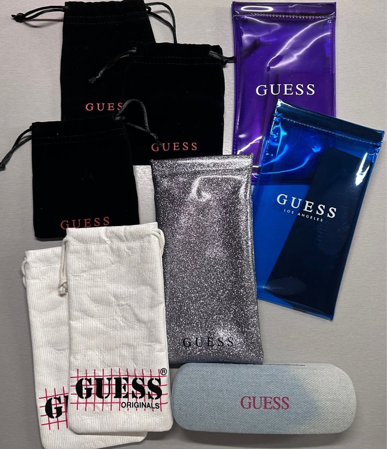 Massor med Guess fodral